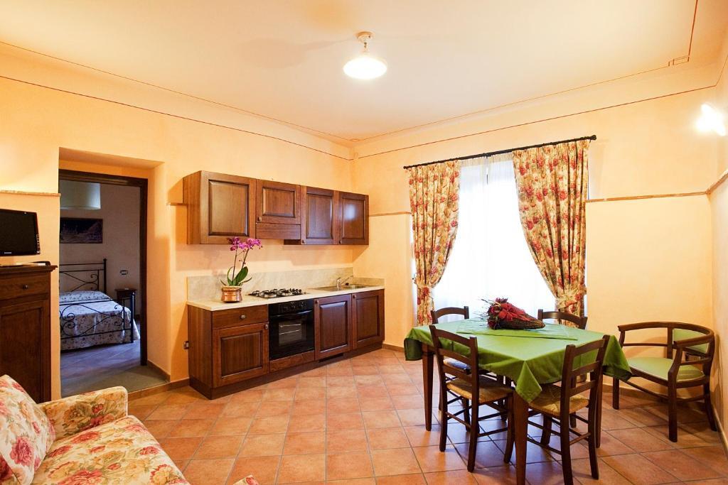 Residenza Palazzo Saloni Aparthotel Montalcino Phòng bức ảnh
