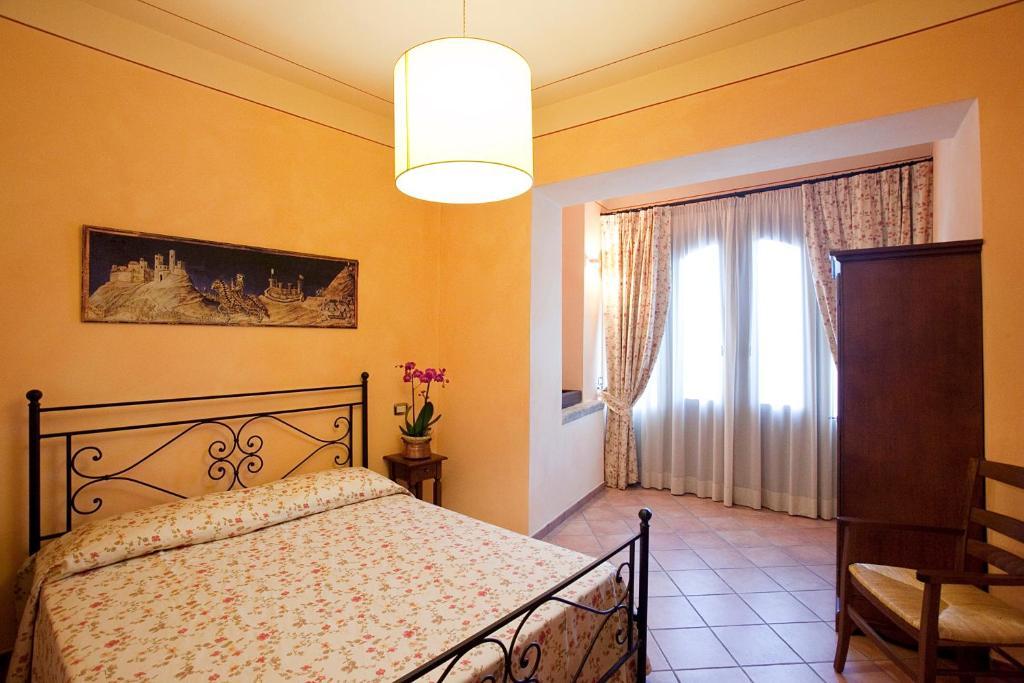 Residenza Palazzo Saloni Aparthotel Montalcino Phòng bức ảnh